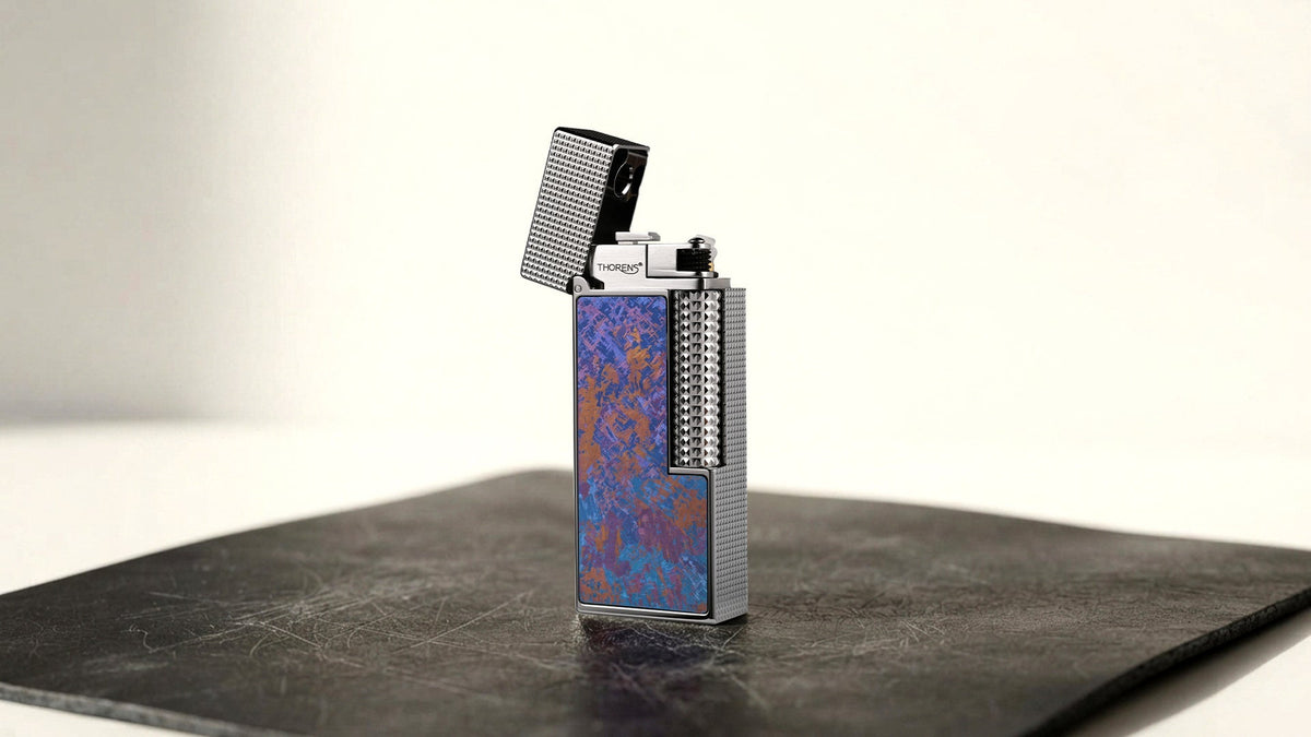 Open multicolor narrow lighter on a dark tabletop
