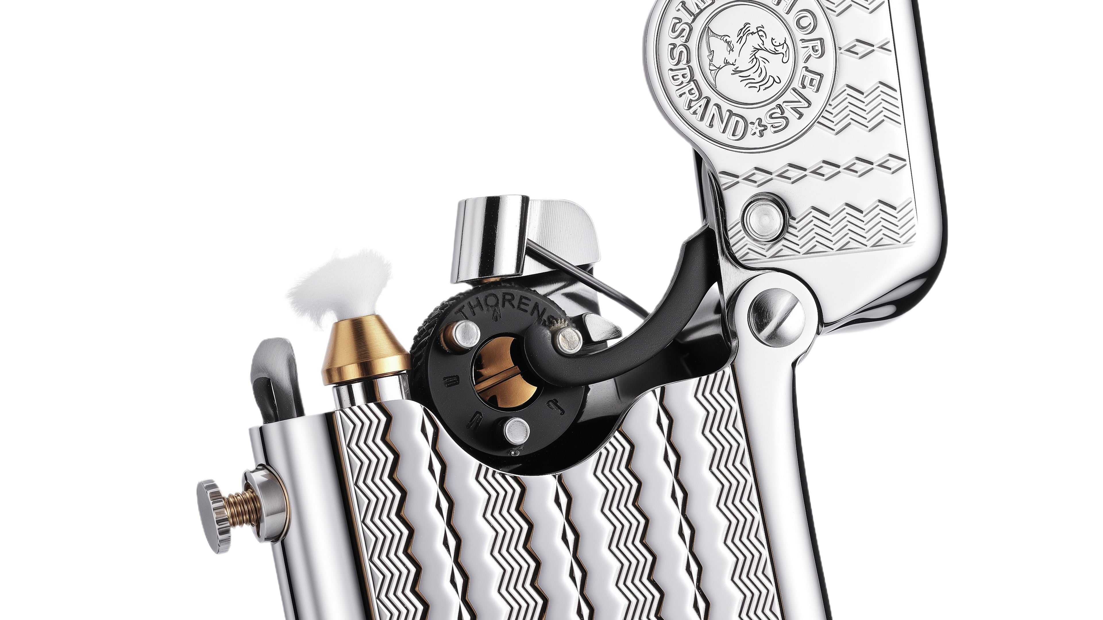 Close-up view of a classic mechanical lighter showing exposed flint wheel, ignition mechanism, and metal construction details