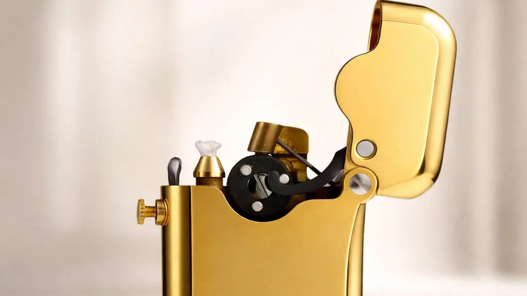 Single Claw brass refillable fluid lighter shown open with mechanical ignition details