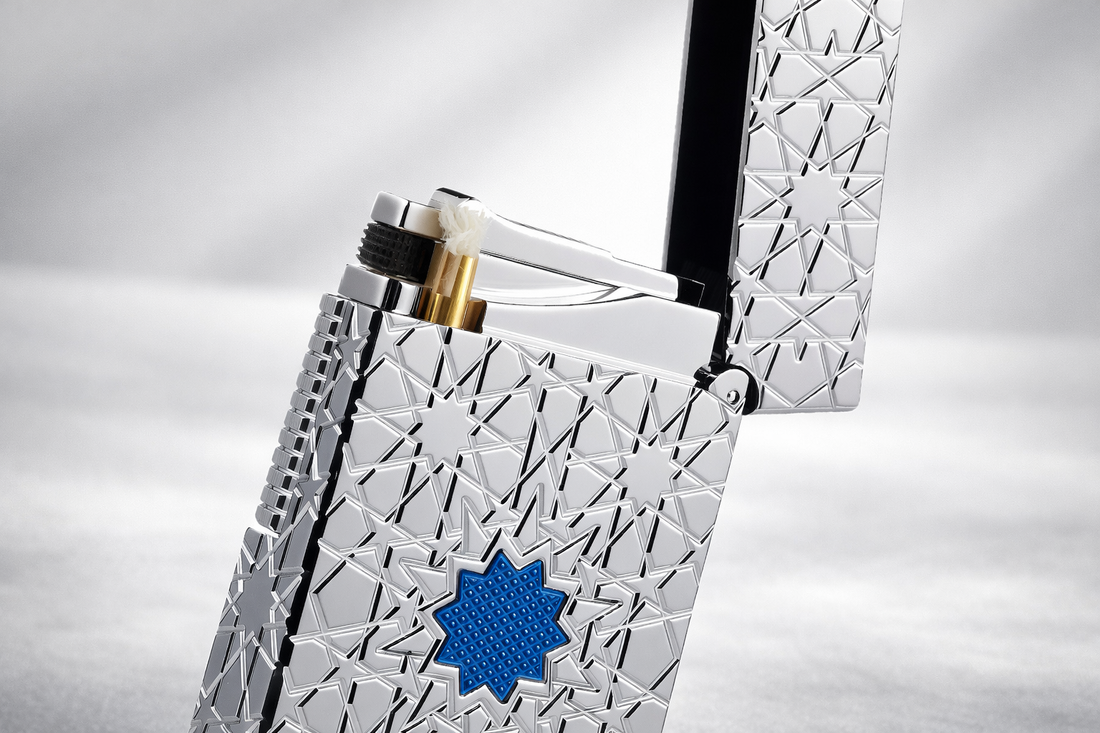 Stellar Mesh silver star shaped fluid lighter with polished metal finish and blue star emblem