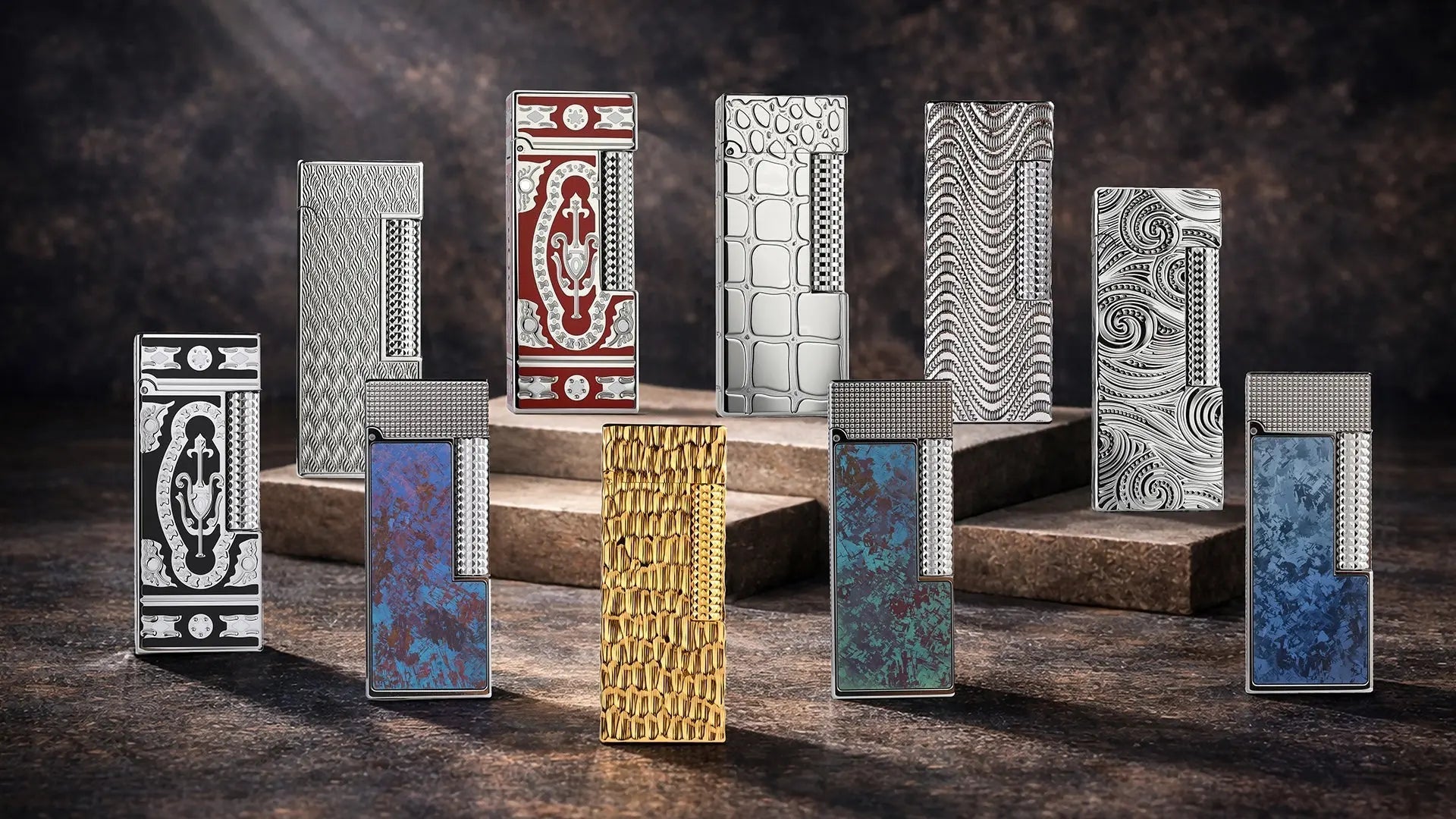 Collection shot of the THORENS Side Slip Narrow Series lighters, featuring multiple slim Swiss-made lighters displayed on stone platforms, including engraved silver models, colored panel designs, and a gold-tone style.