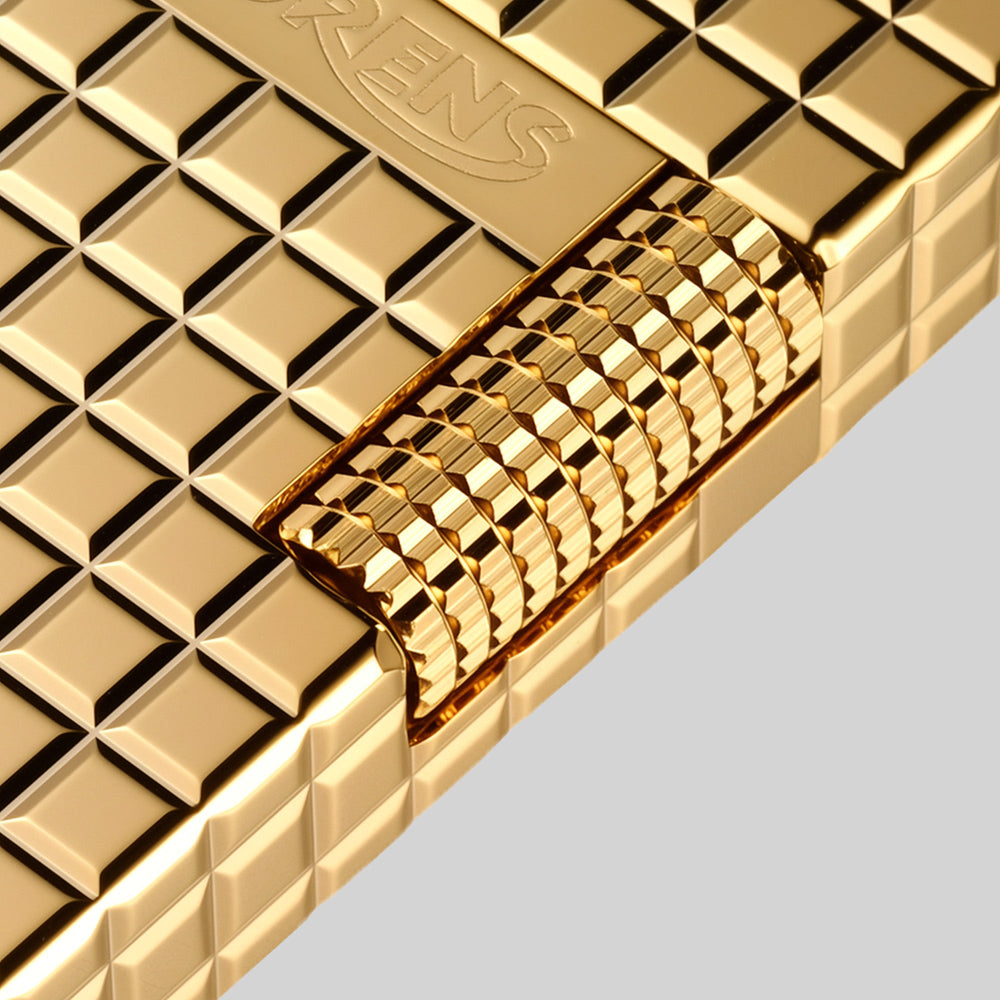 THORENS Crisp Sound - Auric Blocks lighter featuring a precision-engineered gold grid pattern and a tactile, knurled mechanical hinge.