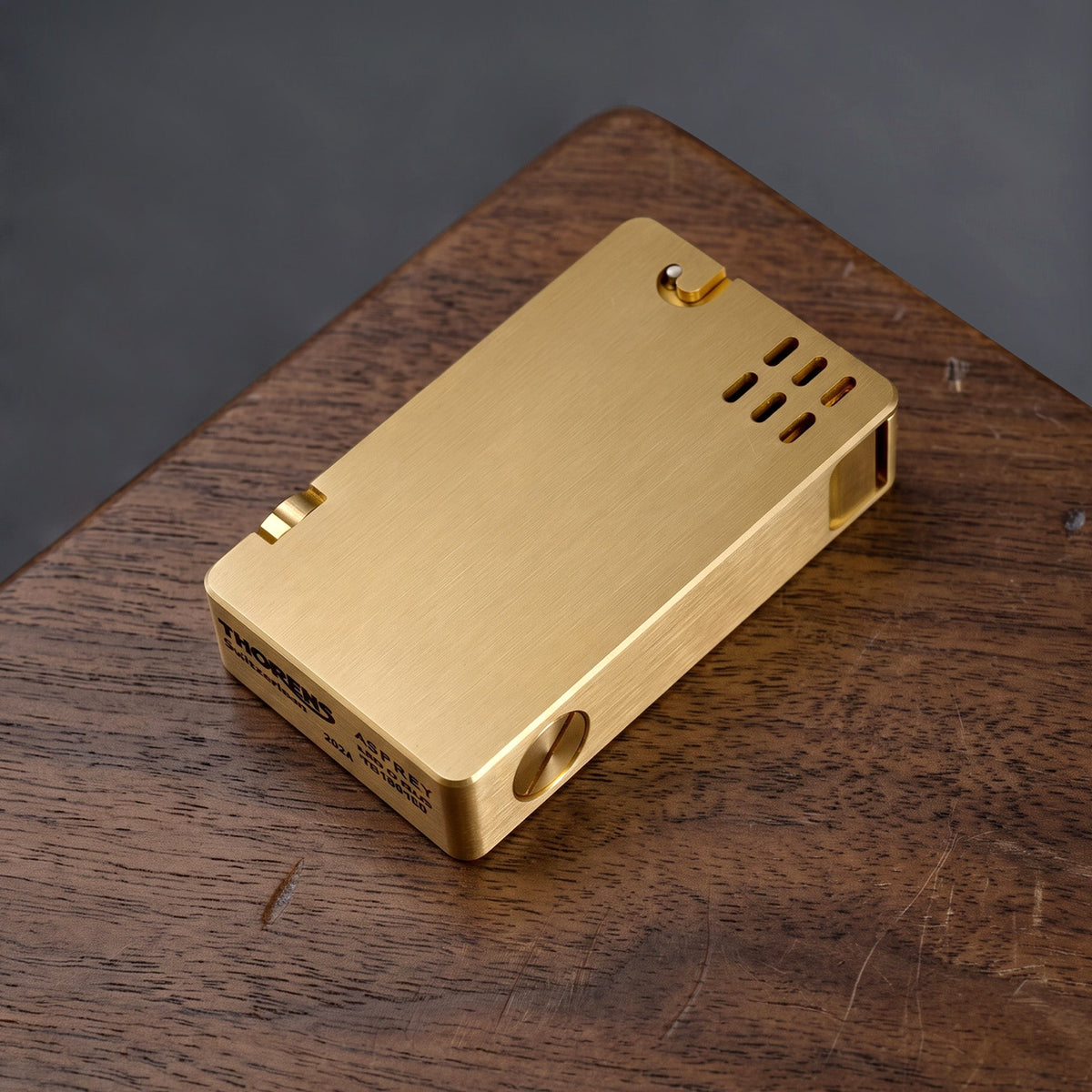 THORENS ASPREY Lighter - Glossy - Brass Finish featuring a precision-engineered solid brass body with a brushed tactile texture.
