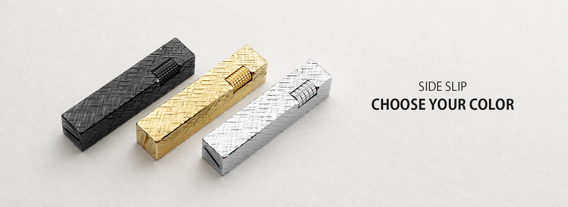 Briquet à gravure dorée