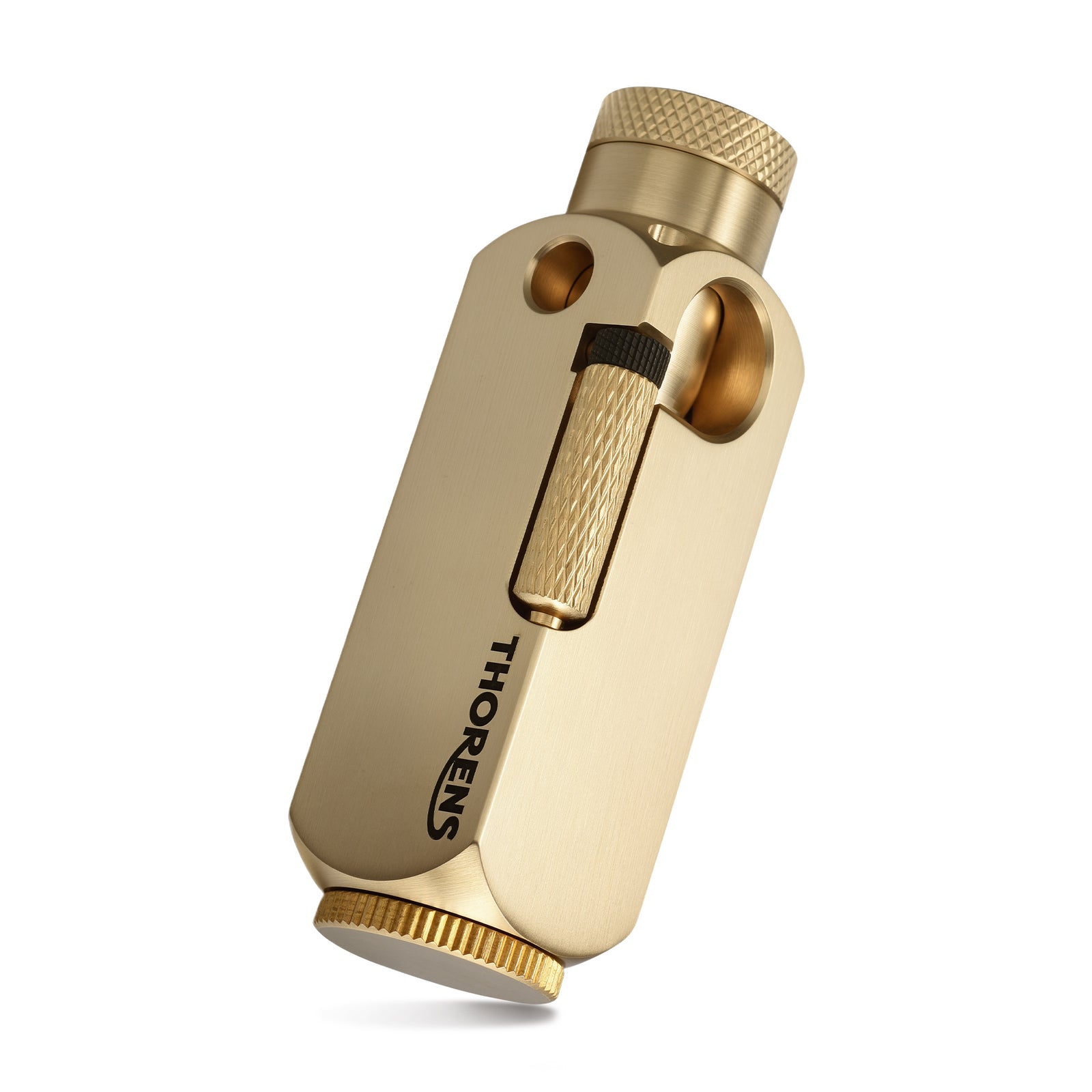 THORENS Flamido Lighter in solid brass construction featuring a precision-engineered mechanical sequence and tactile knurled surfaces.