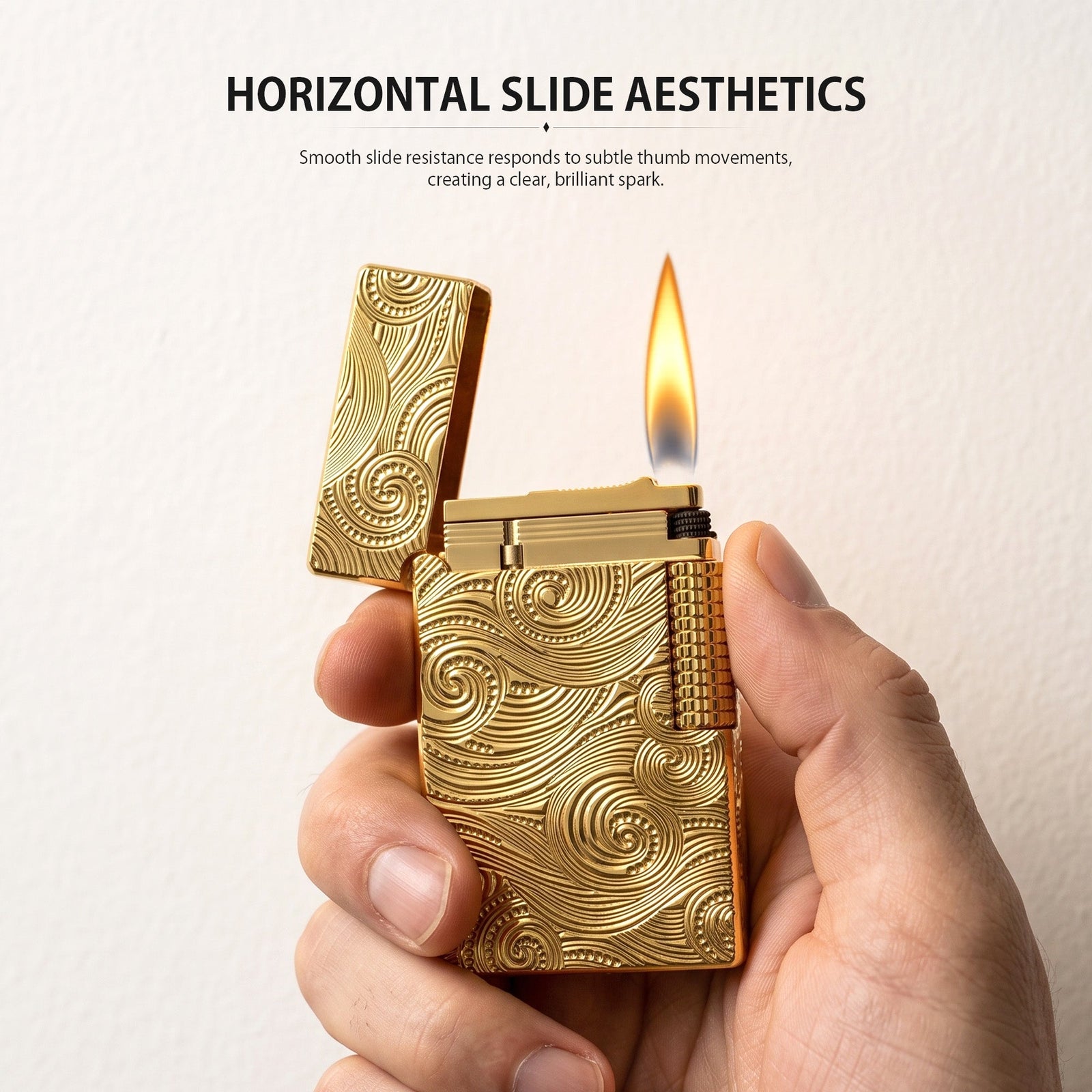 THORENS Crisp Sound - Vortex Engraved - Gold lighter featuring a horizontal slide ignition and intricate precision-etched vortex patterns.