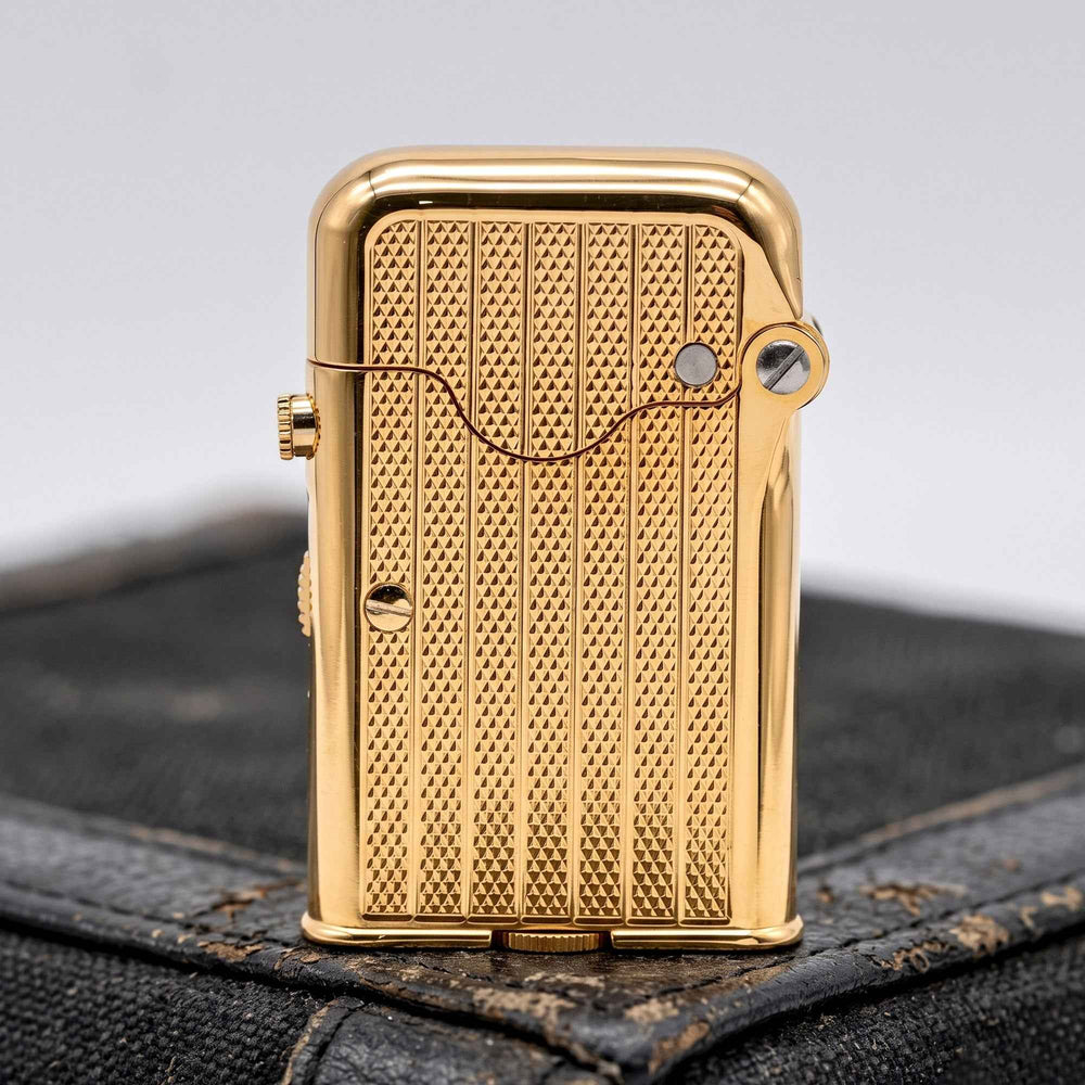 THORENS Gen 7 - Single Claw - TELEFLAM - Fluted Gold lighter featuring a precision-engineered fluted texture and single claw mechanism.