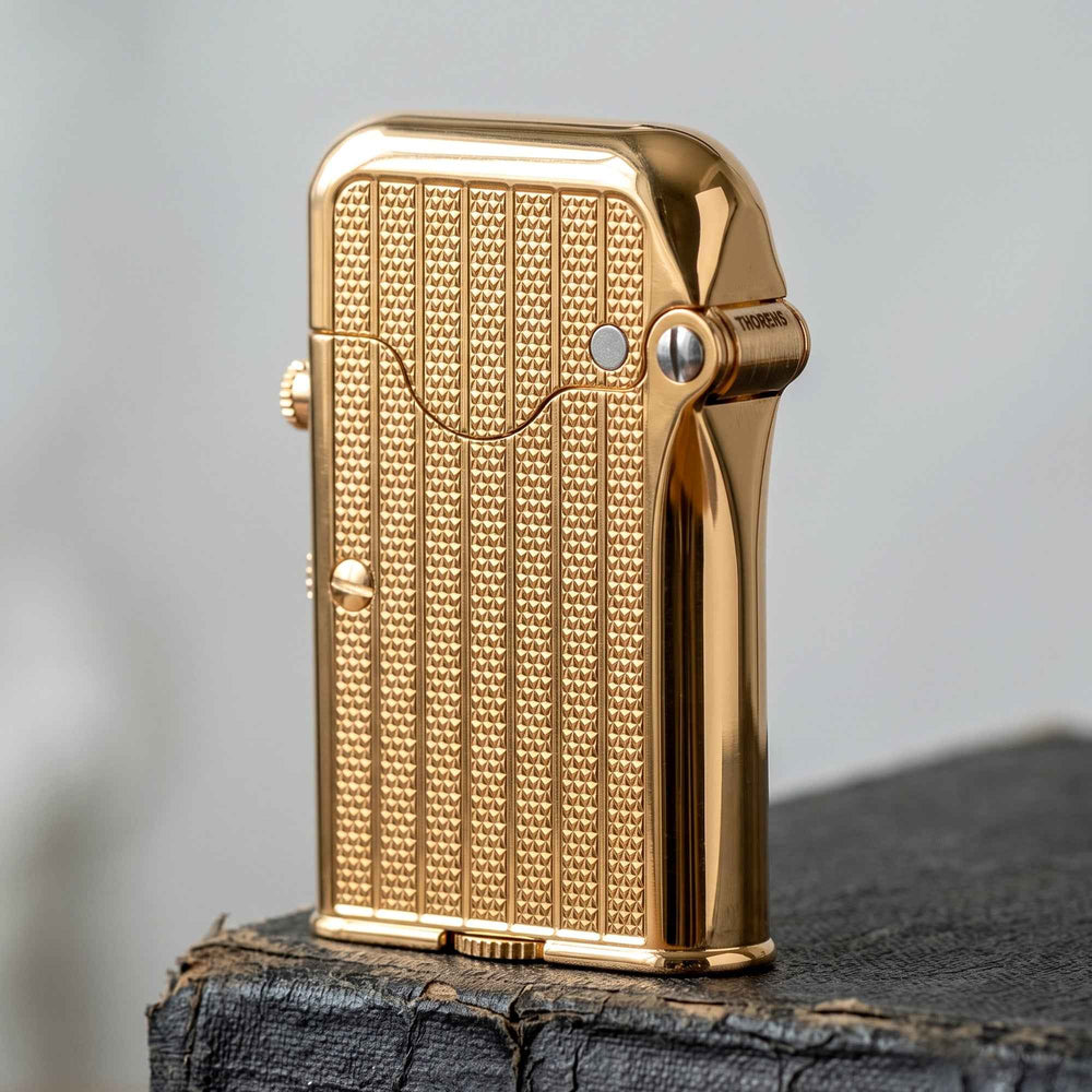 THORENS Gen 7 - Single Claw - TELEFLAM - Fluted Gold lighter featuring a precision-engineered fluted body and mechanical ignition system.