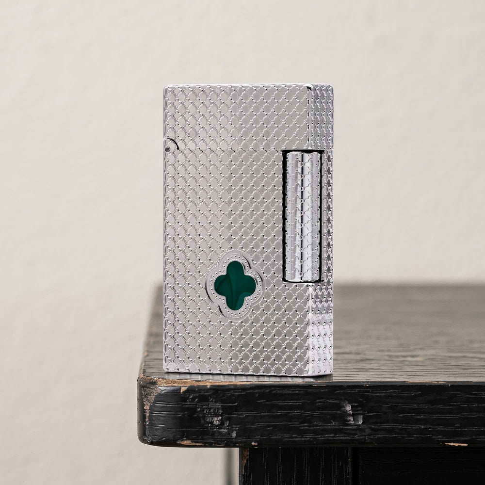 THORENS Clover Monogram Silver – Emerald Clover lighter featuring a precision-etched silver body with a vibrant green clover inlay.