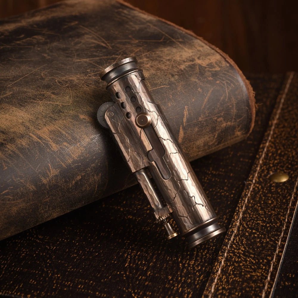 A vertical view of the Battle Soul trench lighter, showcasing its weathered brass body and hand-carved cracks against a vintage leather backdrop.