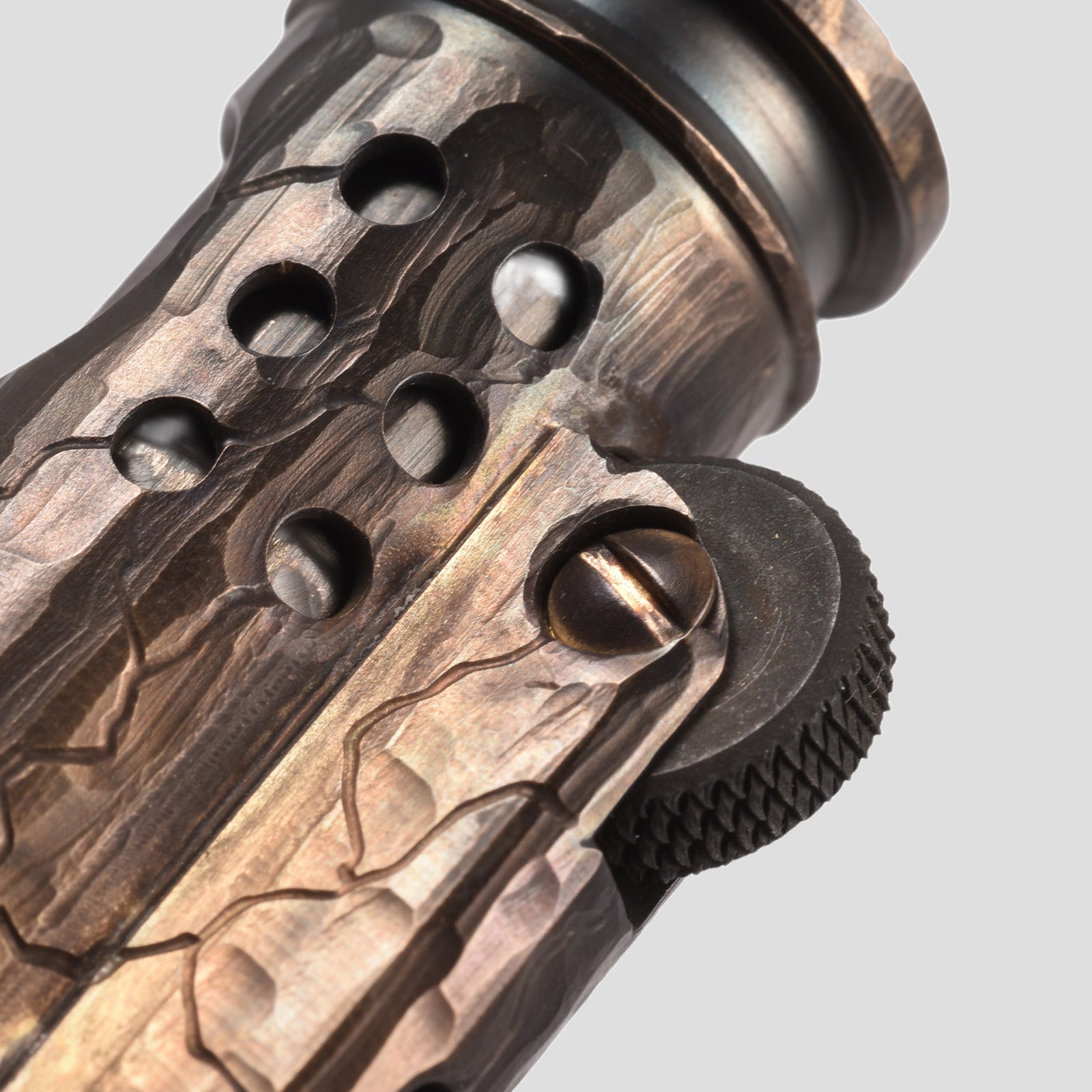 A detailed collage of the Battle Soul trench lighter showing the Thorens engraved base, hand-carved crack textures, and the ventilated windproof sleeve.