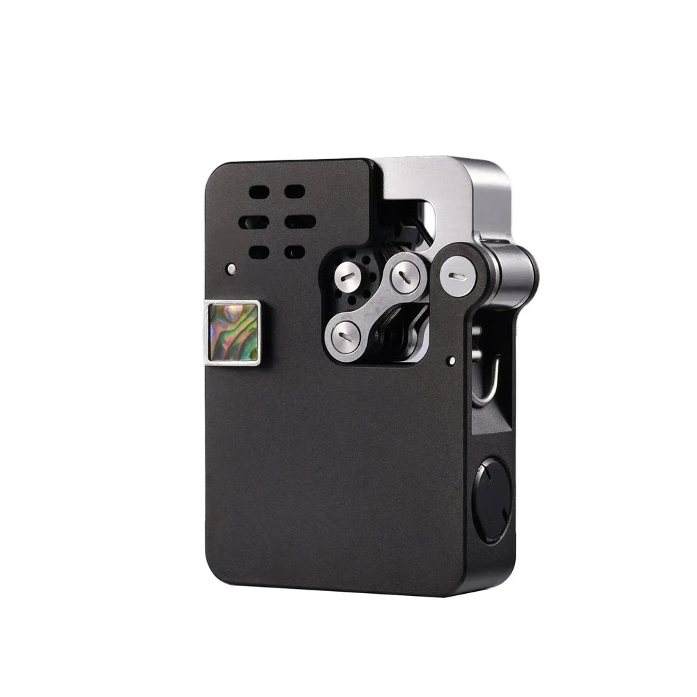 A heavy-duty Ejection mechanical lighter featuring an intricate hollowing machine design and antique brass finish, highlighting its mechanical precision and collectible appeal.