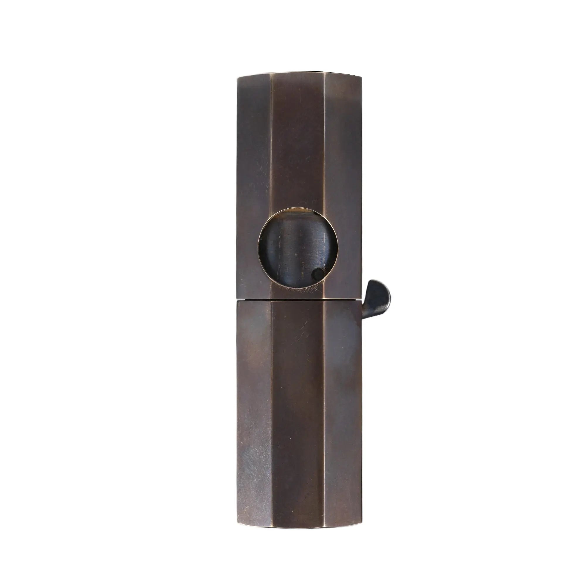 A professional studio front view of the Octagon Trigger Glossy lighter, showcasing its sleek octagonal structure and polished antiqued brass finish.