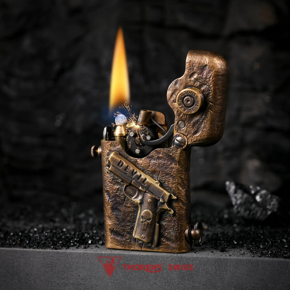 Thorens Gen 1 brass lighter with a lit flame and sparking flint mechanism, featuring the hand-carved gun relief and rugged battle mark finish.