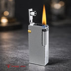 Thorens Slim Cube Silver Mesh lighter shown lit on a softly textured surface, featuring a slim rectangular form, silver mesh finish, polished silver-tone body, and gold-tone accent detail