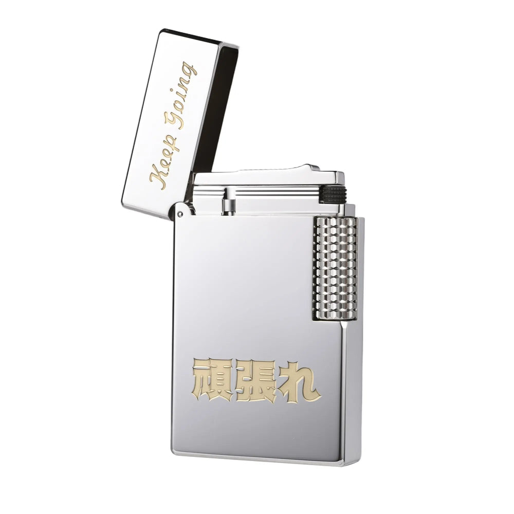 A silver Thorens mechanical lighter with its lid open, revealing intricate internal structures and the "Keep Going" gold engraving, embodying heritage and refined EDC aesthetics.