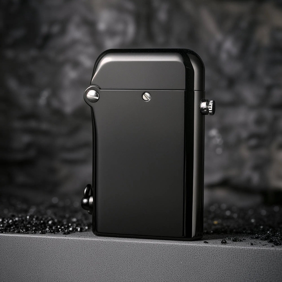 A back-angle shot of the glossy black Gen 2 Double Claw lighter, highlighting the seamless finish, the side-mounted ignition button, and the industrial screw-head detailing.