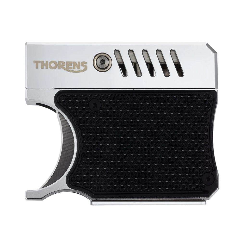 A tactical gun-inspired lighter featuring a polished silver metallic upper with the Thorens logo and a black diamond-textured grip handle for ergonomic use.