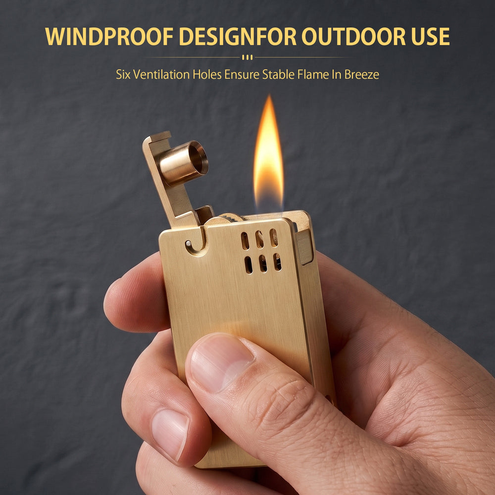 A brushed brass ASPREY lighter with its lid open, capturing the moment of ignition with sparks and a tall, steady flame against a dark background.