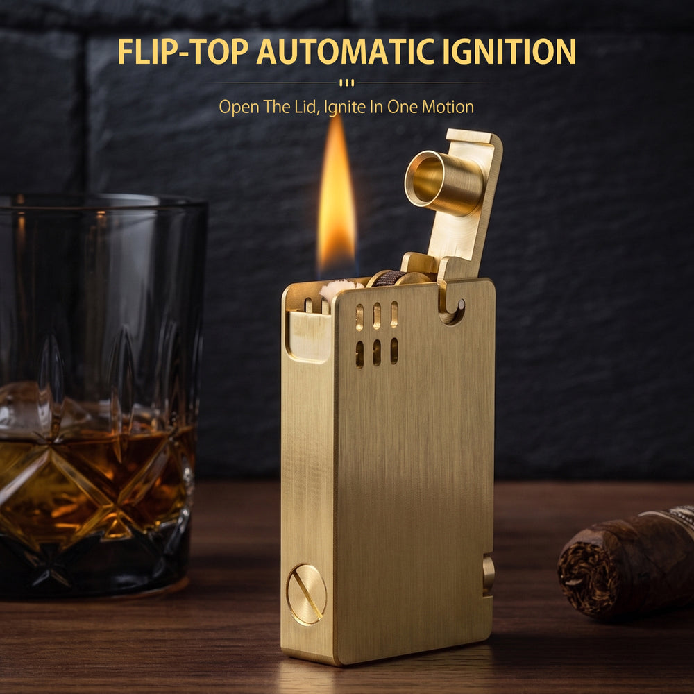 A closed ASPREY lighter featuring a brushed brass finish, vertical ventilation slots, and a sleek rectangular body with refined mechanical details.