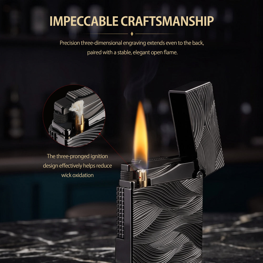A black Aqua Rhythm lighter with an open lid is ignited, showing a steady flame and spark, featuring a dark brass body with silver wave engravings.