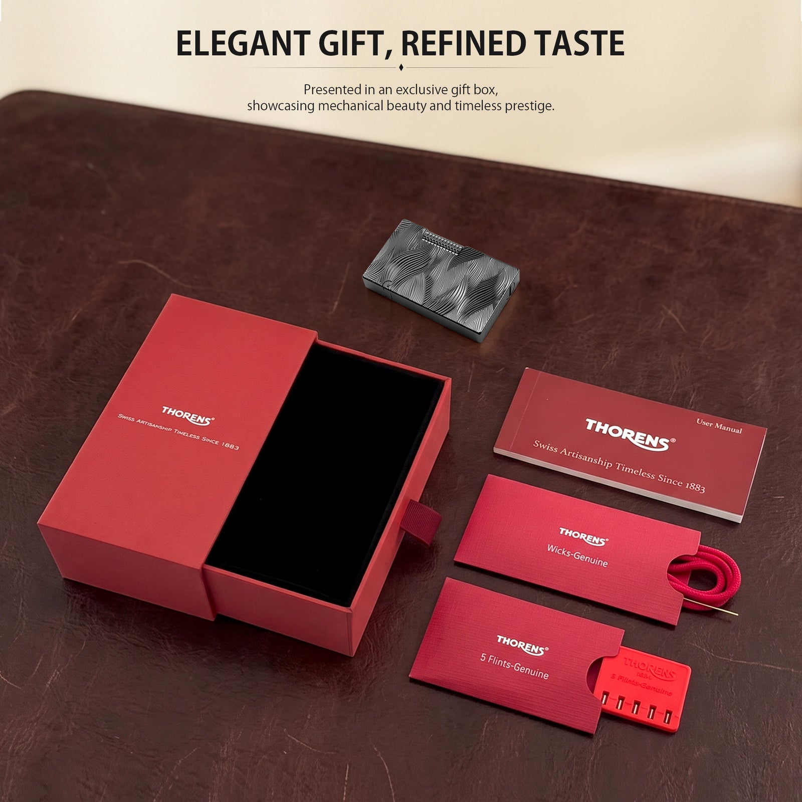 A complete Thorens Aqua Rhythm black lighter set including the signature red gift box, replacement flints, spare wicks, and a user manual.