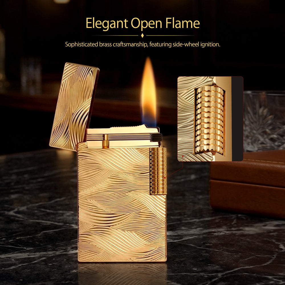 An ignited gold Thorens Aqua Rhythm lighter showcasing a steady flame and active sparks. The deep wave engravings are beautifully illuminated by the fire, set against a dark, warm background.