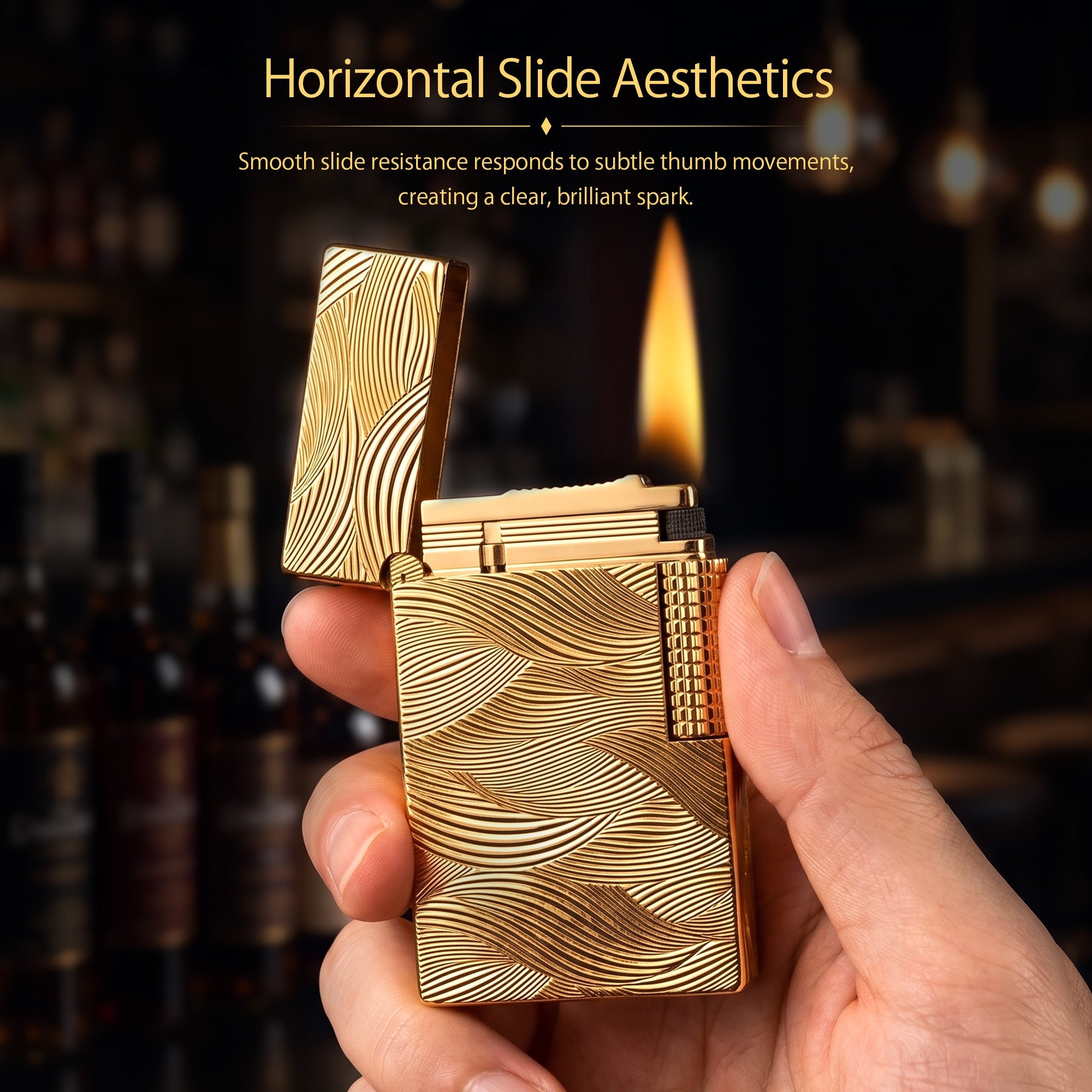 Thorens Aqua Rhythm gold lighter with an open cap, showcasing the brass body and intricate wave-like engravings with a mechanical side roller.