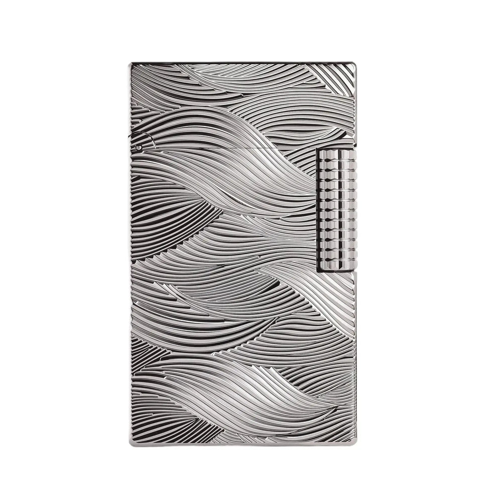 A dark, metallic silver Aqua Rhythm lighter featuring a deep-etched flowing wave pattern across the body and a textured mechanical flint roller.