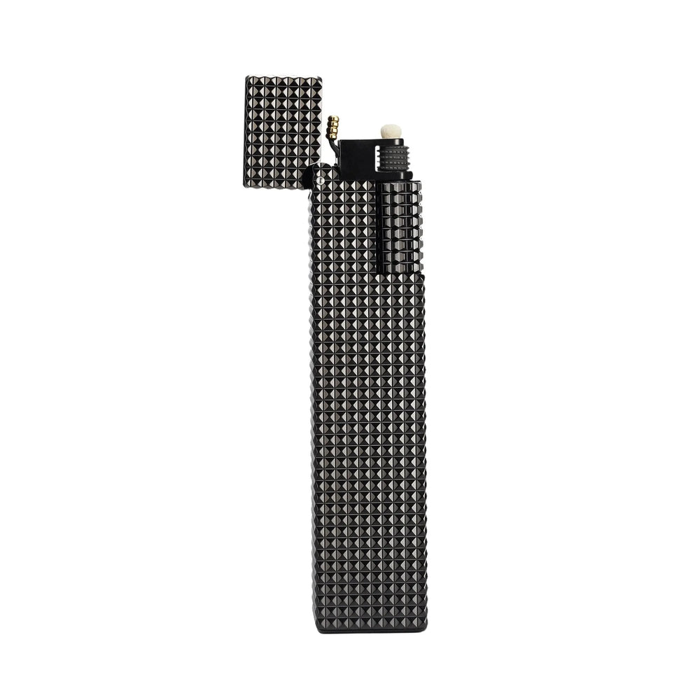 Front view of an open black small square textured Thorens side-slip rectangular lighter with visible flint wheel and wick against a light background