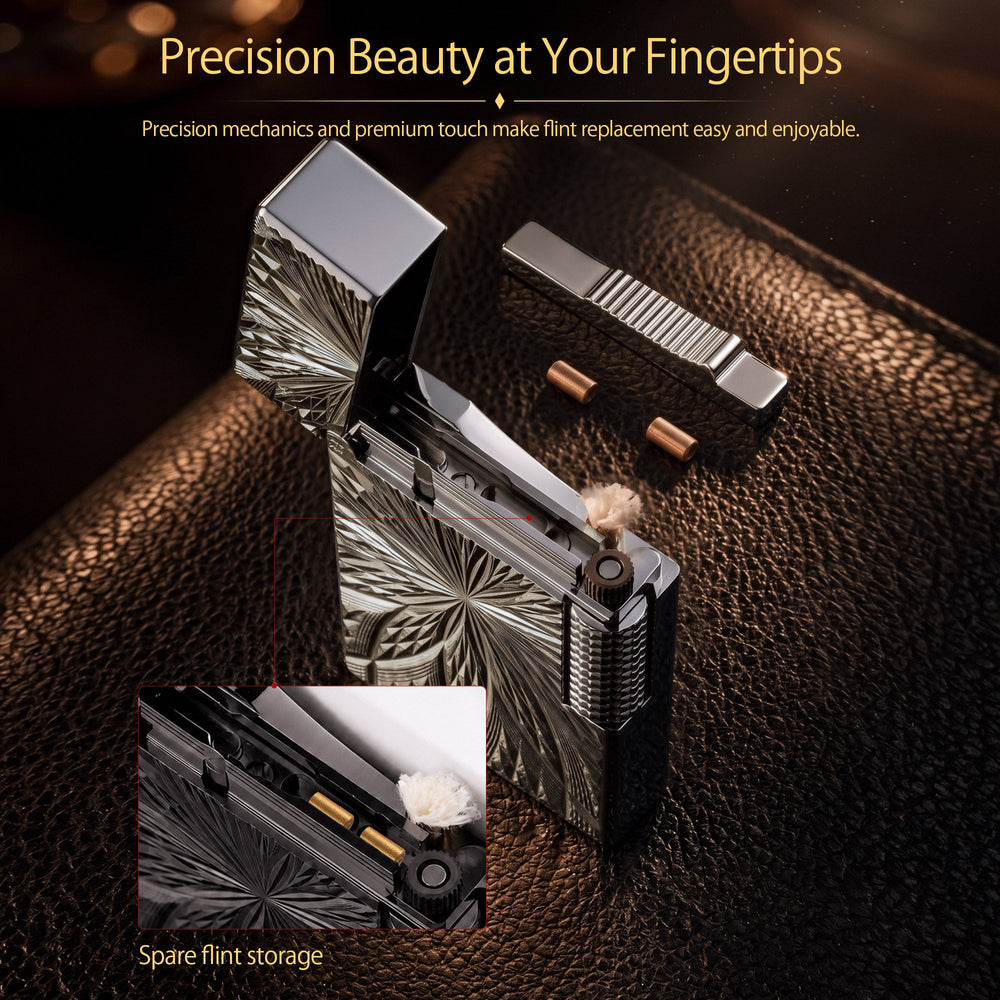 A front-facing view of the Blooming Radiance black lighter, featuring a symmetrical sunburst floral engraving on a polished dark brass body with a side roller.