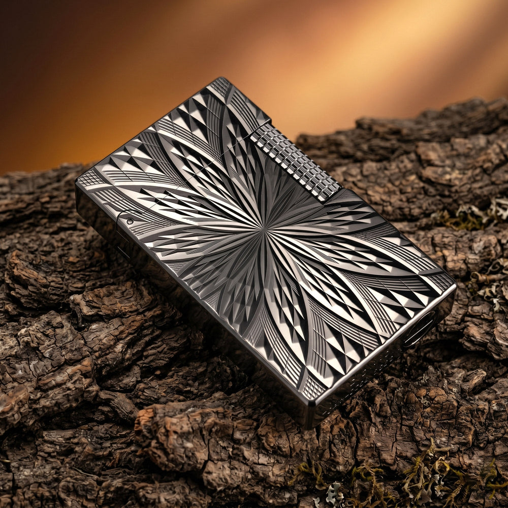A complete overview of the Blooming Radiance black lighter set, featuring the red Thorens gift box, a pack of genuine flints, spare wicks, and the user manual.