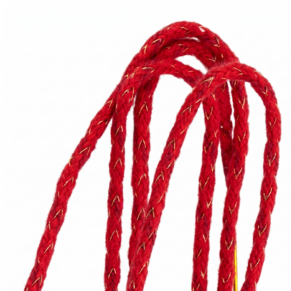 Close-up of Thorens lighter wick showing red braided fiber with integrated copper wire, highlighting the reinforced structure and woven texture.