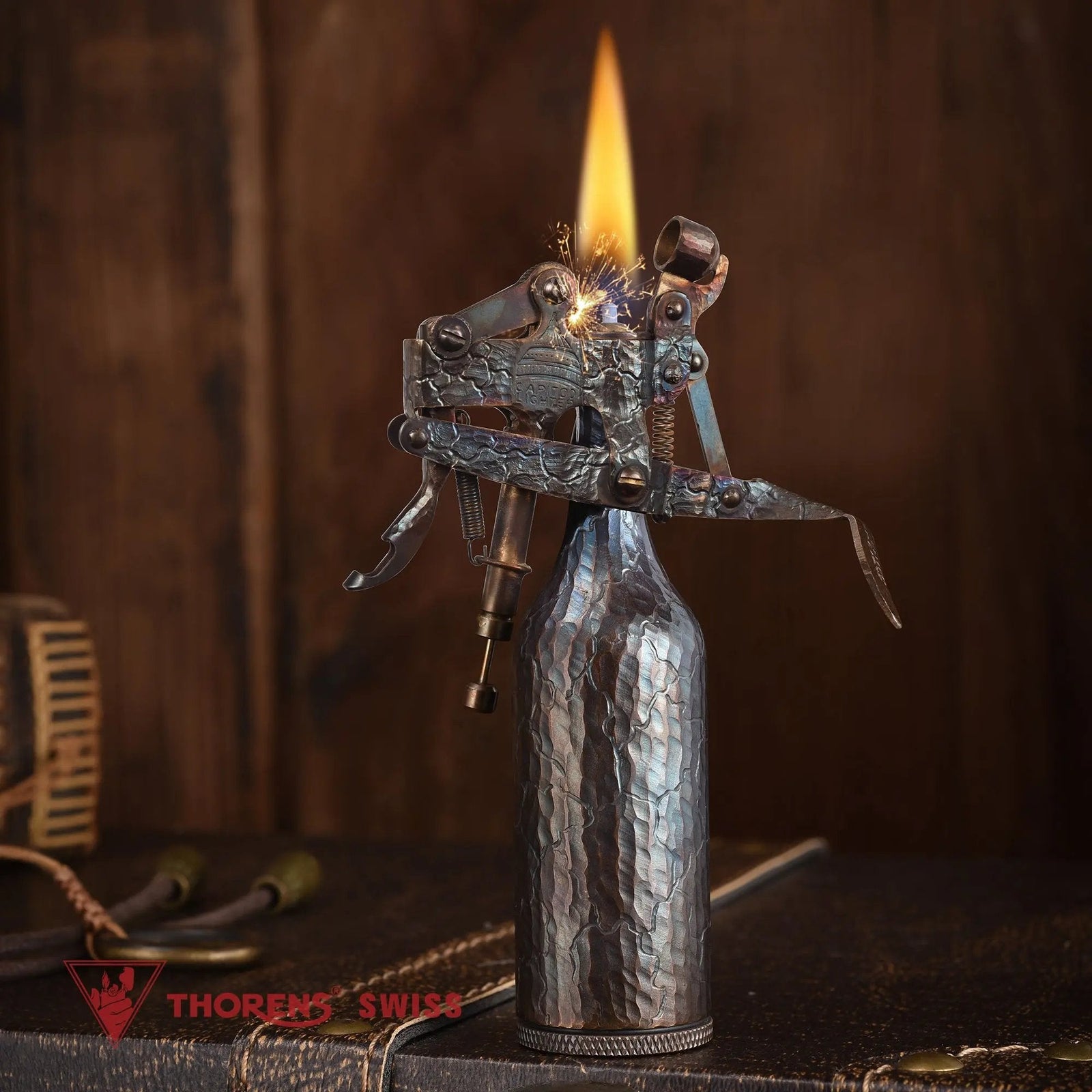 An ignited Capitol Table Lighter featuring a hand-carved crackle texture and iridescent patina, producing a steady flame with visible sparks in a vintage setting.