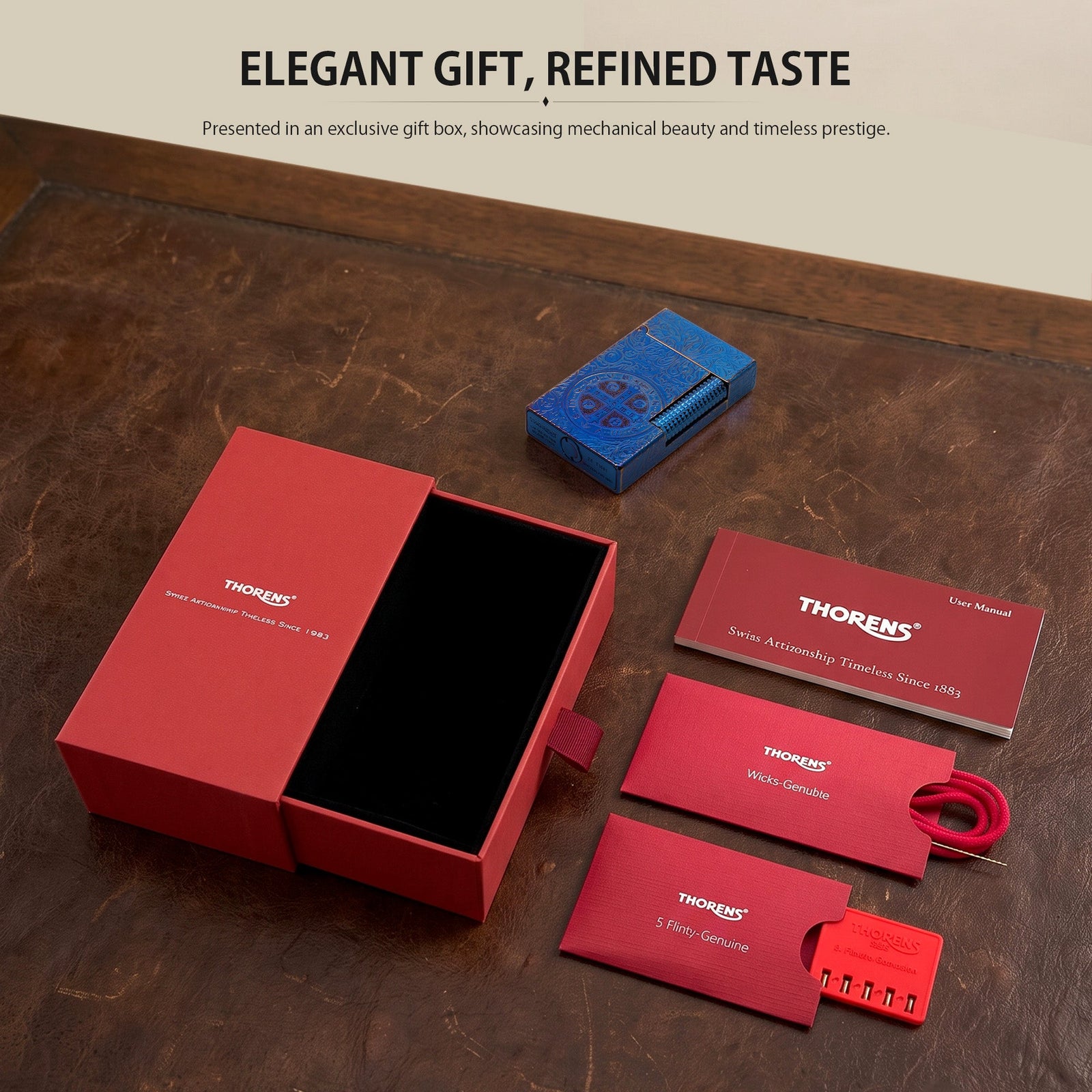 A comprehensive product list for the Constantine Midnight Blue Sigil lighter, including a red textured Thorens gift box, replacement wicks, a pack of five flints, and the official user manual.