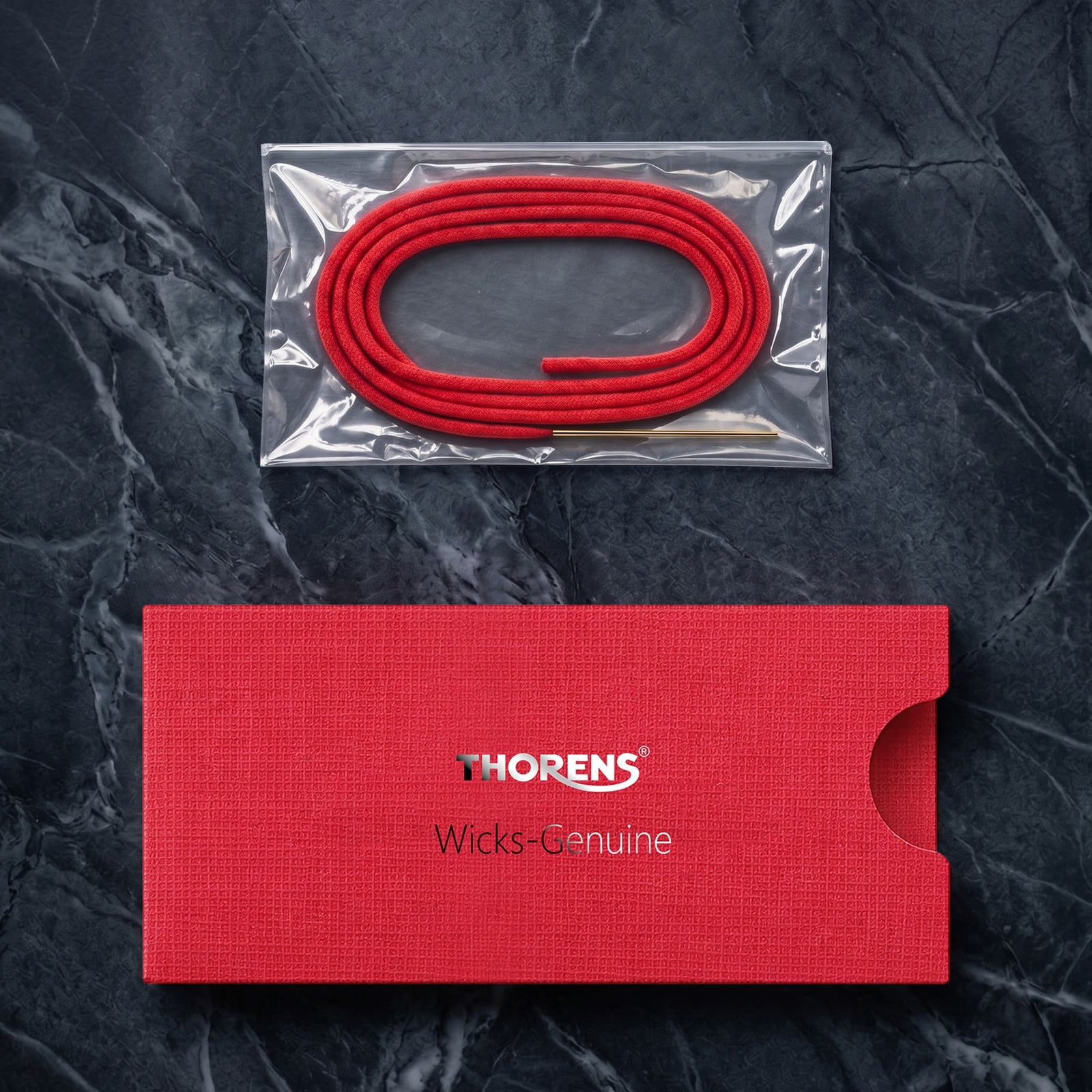 Thorens cotton lighter wick set shown in a clear protective sleeve with red branded holder, highlighting soft braided cotton structure and accessory packaging.