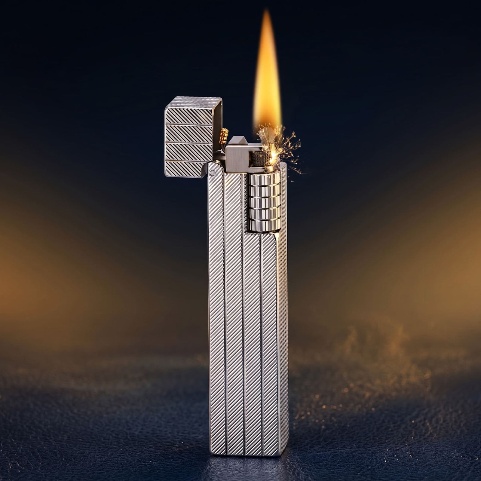 Thorens rectangular lighter in silver shown ignited with lid open, revealing diagonal engraved brass body, exposed flint wheel, and steady flame against a dark gradient background.
