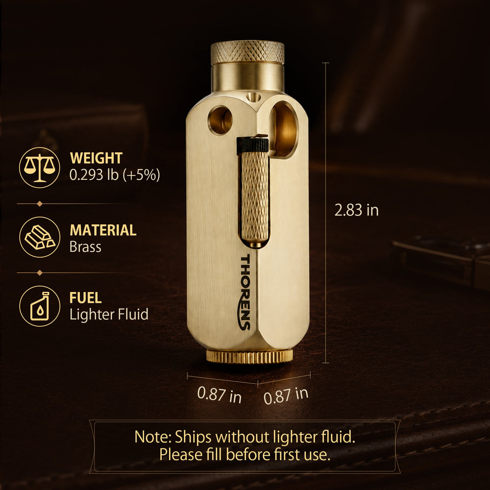 A vertical view of the Flamido brass lighter, highlighting its brushed finish, octagonal body, and the extended plunger mechanism, standing on a dark chessboard.