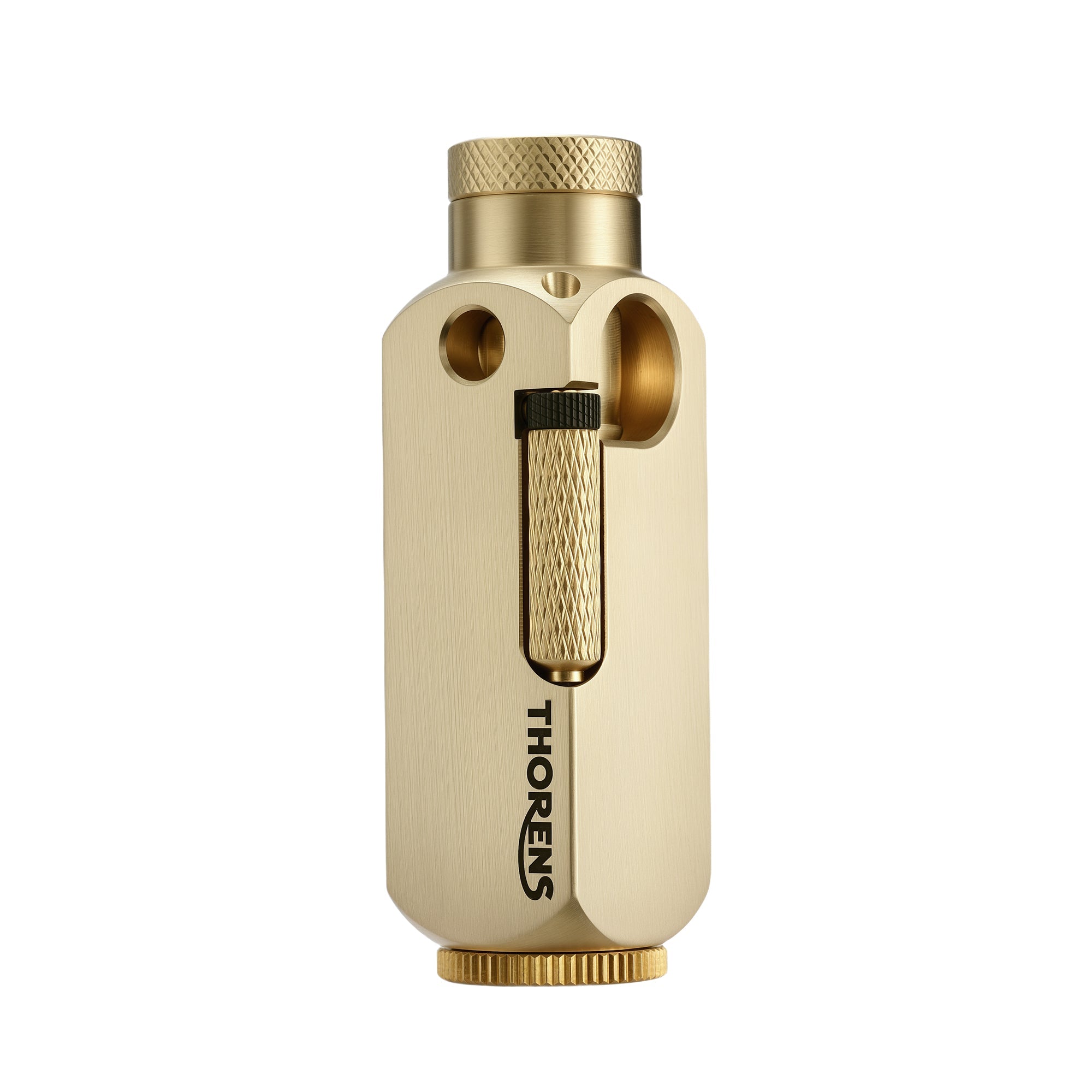 A cylindrical Flamido lighter in brushed brass, showcasing its heavy-duty mechanical structure, knurled ignition roller, and engraved Thorens branding.