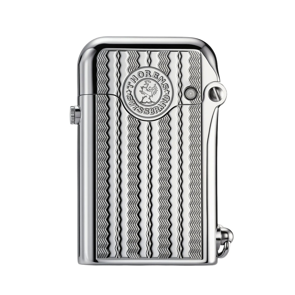 A front view of the Thorens Gen 1 Single Claw lighter in silver, showcasing the brand logo and intricate water ripple engraving on the metal body.