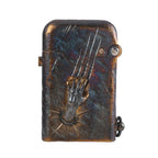 A Gen 1 Single Claw lighter featuring a 3D sculpted skeletal spirit claw and deep scratch marks on a weathered, antique patina brass body.