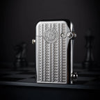 A closed silver Gen 1 Single Claw lighter with an intricate water ripple engraving and a Thorens Swiss emblem, standing on a dark chessboard.