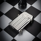 A polished silver Gen 1 Single Claw lighter featuring a textured water ripple engraving and bottom brand stamping, resting on a checkered surface.