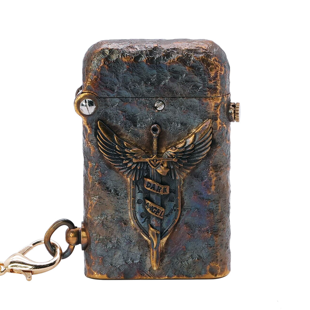 Thorens Gen 2 Double Claw Dark Angel Blade lighter shown closed, featuring a raised winged blade crest, distressed brass texture, and side chain attachment