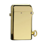 A Thorens Gen 2 Double Claw mechanical lighter featuring a mirror-polished brass finish, side-mounted safety switch, and a bottom lanyard ring.