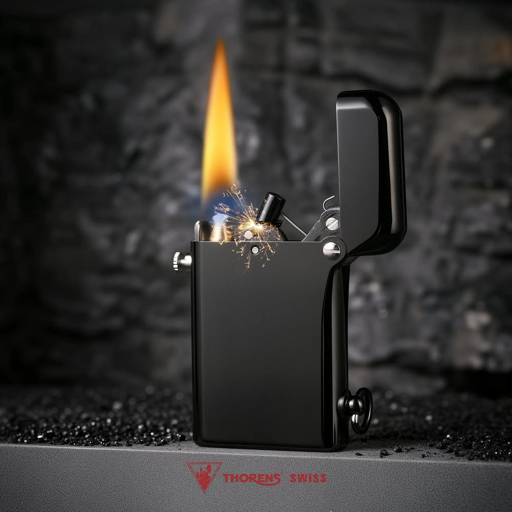 A black glossy Thorens Gen 2 lighter with open lid, igniting a flame and striking sparks from its dual claw mechanism against a dark, textured background.
