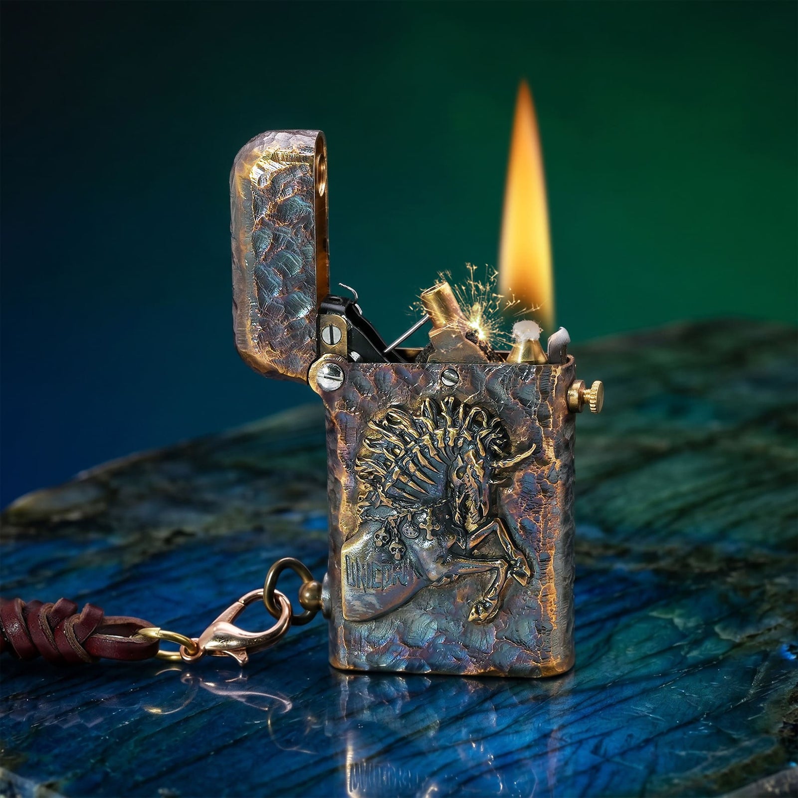 Thorens Gen 2 Double Claw Warhorse lighter shown open and ignited, featuring a raised horse relief, distressed brass finish, bright flame, and attached leather charm.