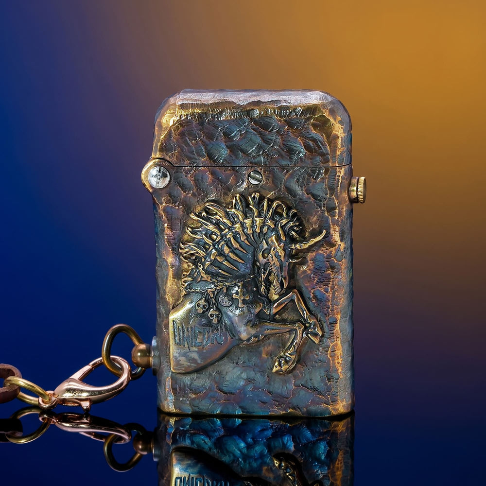Thorens Gen 2 Double Claw Warhorse lighter shown closed with raised horse relief, distressed blue-brown brass finish, and side chain.
