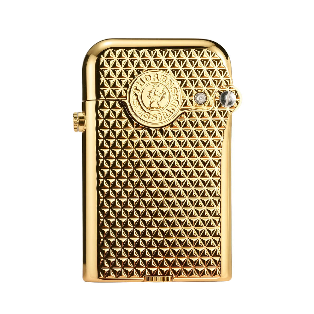 A gold Gen 3 Single Claw lighter featuring a deep-etched diamond grid texture and the Thorens Swiss Brand rooster crest on a polished brass body.