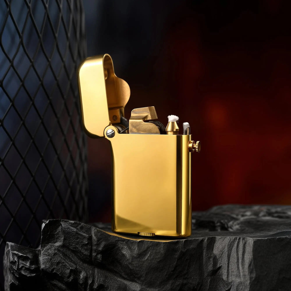 The Thorens Gen 3 Single Claw glossy brass lighter shown in an open position, revealing the precision internal mechanical claw and wick structure against a dark, refined background.